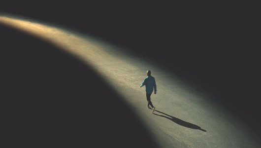 Man_walking_into_light-530x300.gif