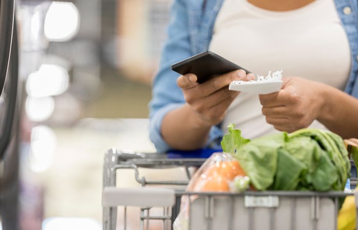 woman-shopping-supermarket-inflation-prices.jpg